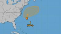 Hurricane center tracks system off East Coast