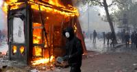 France orders localized curfews after violent protests and widespread looting