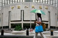 Chinese Banks Face Backlash Over Loans to Help Workers Pay Social Insurance