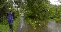 ‘We are all working together to bring some normalcy back': Mayors lead cleanup after Champi