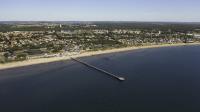 Between Gothenburg And Copenhagen Is An Idyllic Coastal Town With Beaches, Tasty Eats, And An Iconic Stone Bridge