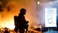 French Cities Impose Curfews after Weekend Protests and Looting