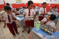 Indonesia's Free Meal program cuts hungry students to 16 percent