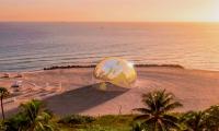 Giant mirrored globe and concert venue will rise on Miami Beach during art week