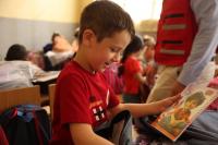 QRCS distributes school bags to underprivileged students in Syria