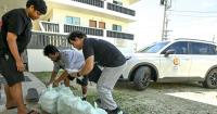 Organizations distribute meals to residents in need following Super Typhoon Champi