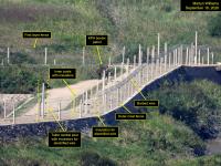 Across the Border: North Koreans Work on the Southern Border Fence 
