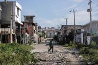Deported Haitians return to an unfamiliar country with no resources for them