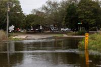 Coastal flood warning is issued for Virginia Beach, coastal flood advisories have expanded