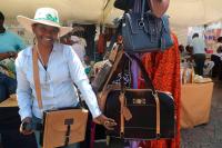 She quit a 30-year banking career to make leather bags