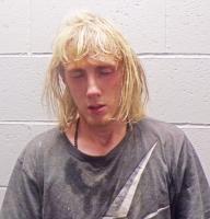 Man Accused of Burglary After Being Found Hiding in Business Closet