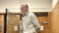 Cop accused of tipping off drug dealers suspended on pay while awaiting April trial