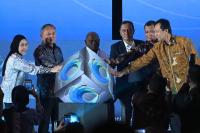 Indonesia's rights minister says development must be felt by public  