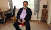 The Bangladeshi migrant who moved into a retirement home: Residents celebrate as man, his 28-year-old wife and twin daughters leave after 'making our lives hell' for two years