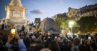 Housing activists in Lisbon take down their tents but choose to sleep outdoors.