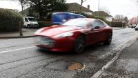 UK government announces extra £220m to be spent on pothole repairs