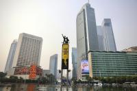 Greenpeace activists released after banner protest at Jakarta landmark