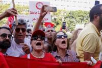 Tunisian police clash with protesters in capital on day of heightened tensions