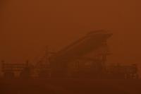 Airlines, passengers bear cost of haze-hit flights