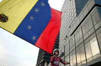 Venezuela protests demand return of Nobel winning leader Machado