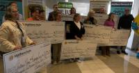 Matthews Auto Presents Over $126,000 to Children's Charities