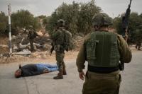 Israel orders West Bank closure after army kills 2 Palestinians it says were behind an attack