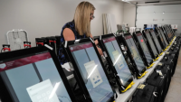 Voters in South Carolina, other states report touchscreen vote-flipping as early voting surges