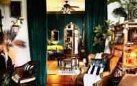 This Louisiana Airbnb Near New Orleans' Garden District Has a Dark, Romantic Side