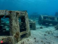 In late 2020, New Jersey crews placed nearly 6,000 tons of retired container-inspection concrete forms on the seafloor off Manasquan, adding about 1.25 acres of reef habitat