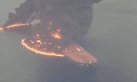 Beaches shut after oil tanker 'hit in missile strike' near Strait of Hormuz causes huge spill close to UAE tourist resort