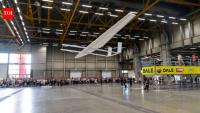 Seven Italian students built a paper aircraft with a 20-metre wingspan and successfully flew it inside a hangar