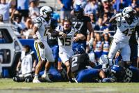 Behind late stop, West Virginia hangs on for 24-20 victory at TCU