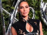 Kim Kardashian wows in a figure-hugging leopard print gown and this surprising, versatile accessory