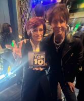 Billy Morrison Presents Sharon Osbourne With Ozzy Osbourne's Official Award For The Top 10 Vinyl Hit Single "Gods Of Rock N Roll"