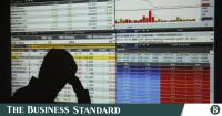 Stocks end flat in holiday-shortened week