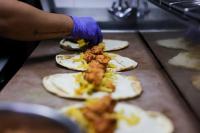 Beirut's $13 chicken sandwich becomes symbol of Lebanon divide