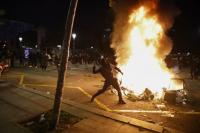 Barcelona unrest leaves 128 arrested as city vows to pursue compensation for damage