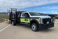 Colorado’s Plan to Protect Emergency Workers on the Shoulder? Giant, Neon Green Ford Trucks