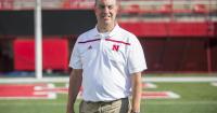 A voice remembered: Greg Sharpe’s legacy brings Nebraska, Kansas State broadcasters together