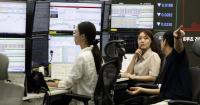 Asian shares start the week cautious as oil prices ease