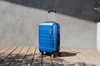 The Tech Behind Self-Weighing Suitcases, Explained