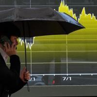 Investors brace for tech earnings, central bank decisions
