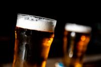 Even just two drinks a day can be far riskier for health than previously thought, study warns