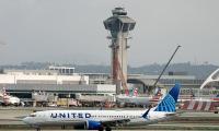 United flight heading to Newark forced to turn back to Las Vegas after flight attendant allegedly saw passenger texting about plans to hijack the plane