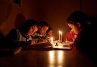Gaza’s displaced families are struggling to keep the lights on