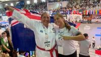 Pacific university lecturer champions Pacific excellence on and off the mat
