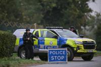 Two charged with UK security offences over airbase plot: police