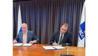 AMI, TASS Sign Media Cooperation Agreement