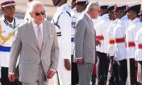 King Charles arrives in The Bahamas as he kicks off Caribbean tour amid demands from Commonwealth nations for slavery reparations - and monarch 'won't shy away from shameful past'