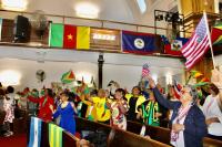 International Day Sunday sermon engages nationals from 26 nations at spirited celebration